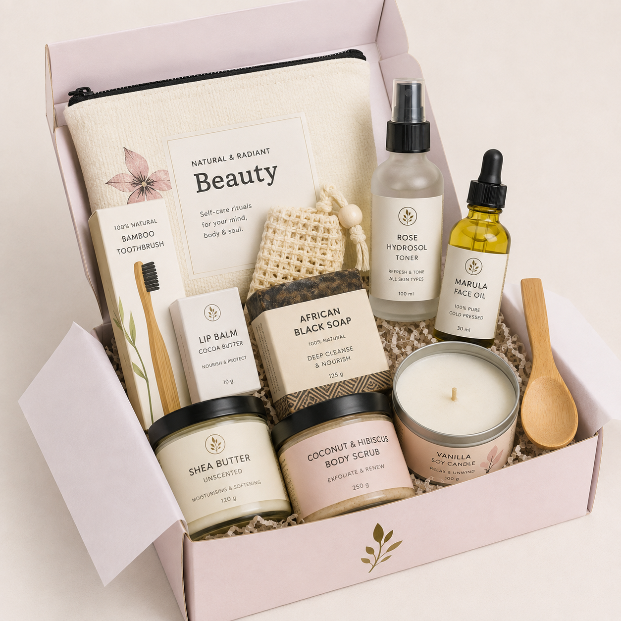 Natural and Radiant Beauty gift box with rose toner, marula oil, shea butter, body scrub, soap, candle, and toothbrush